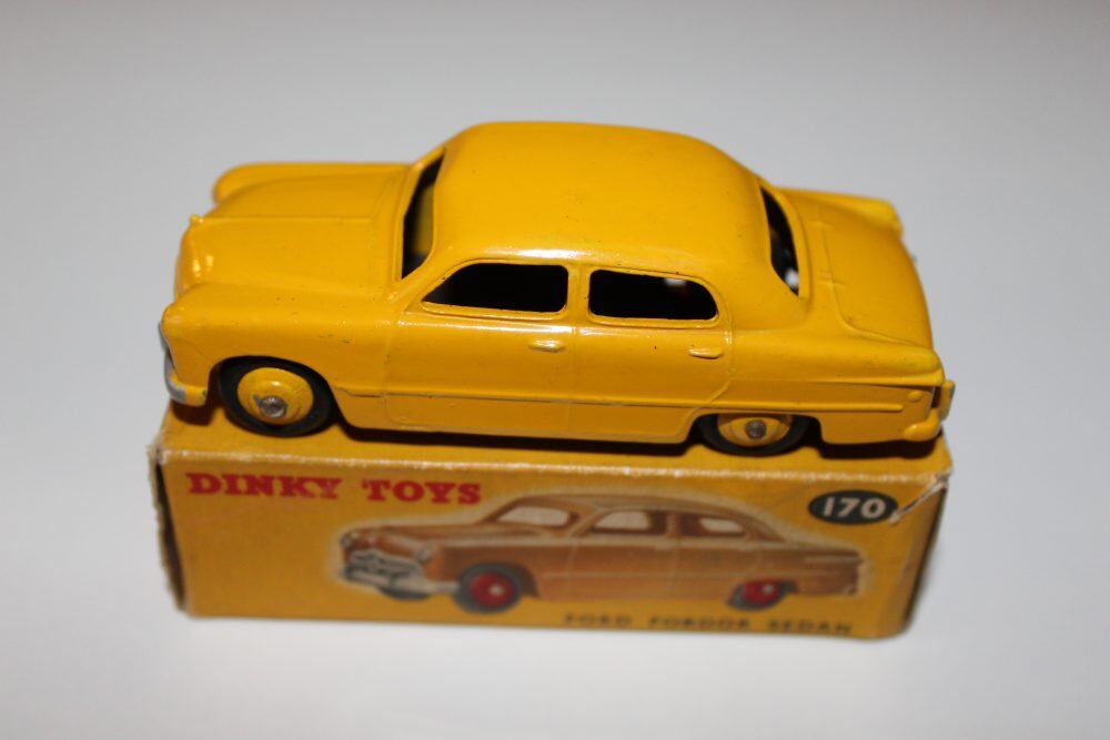 Vintage yellow Dinky Toys Ford Forder model car for collectors.