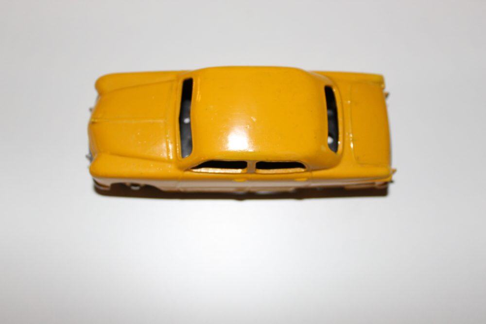 Yellow Dinky Toys Ford 139a/170 diecast car, vintage collectible.