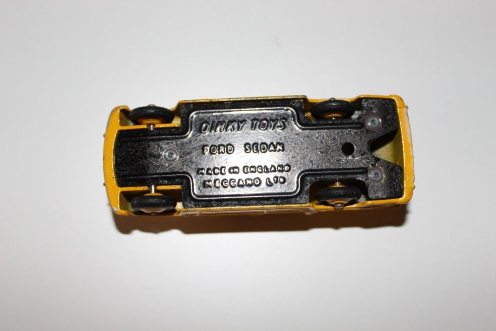 Dinky Toys Ford 139a/170 diecast model car, underside view.