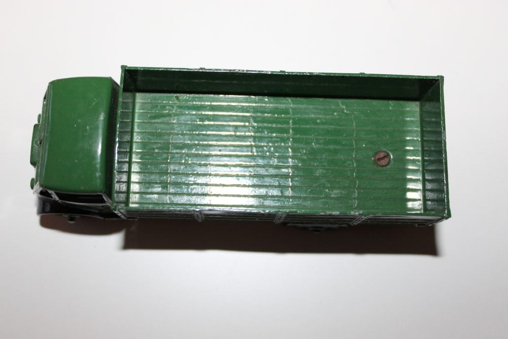 Vintage green diecast model of a Dinky Toys 511 Guy 4-Ton Lorry for collectors.