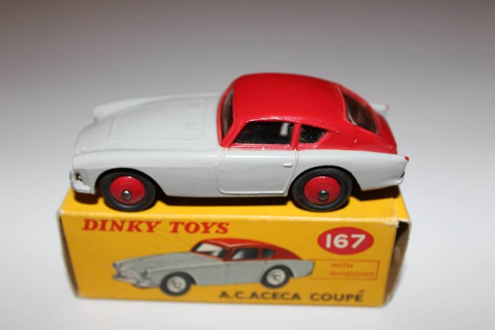 Vintage Dinky Toys 167 A.C. Aceca Coupe model on yellow box, detailed diecast car.