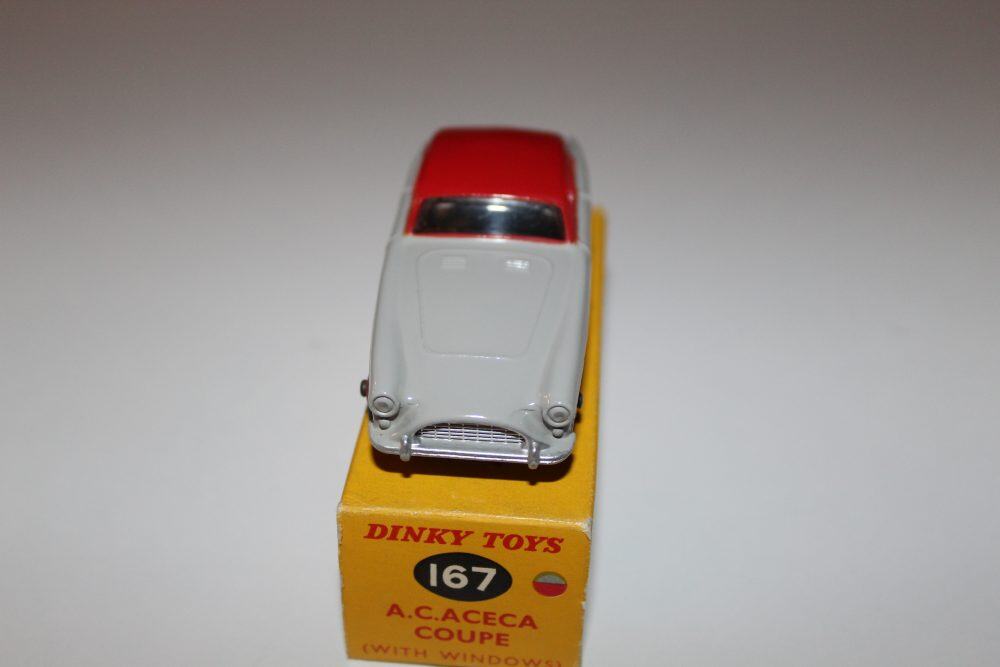 Dinky Toys 167 A.C. Aceca Coupe diecast model on its original box, vintage collectible.