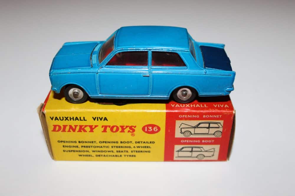 Vintage blue Dinky Toys 108 Sam's Car model on original box.