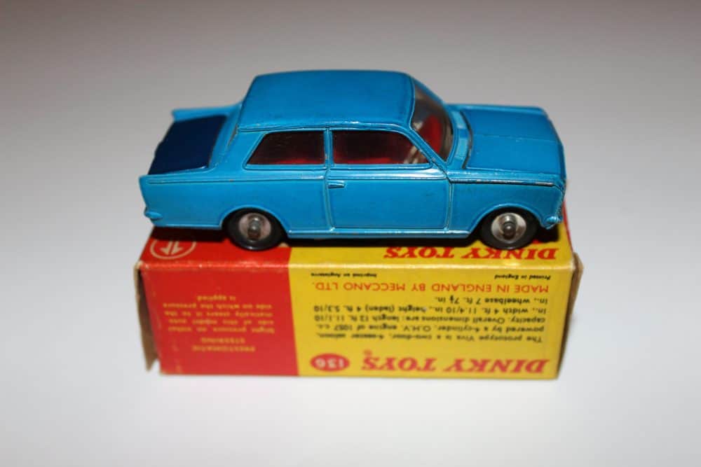 Dinky Toys 108 Sam's Car diecast model on red and yellow box, vintage toy vehicle.