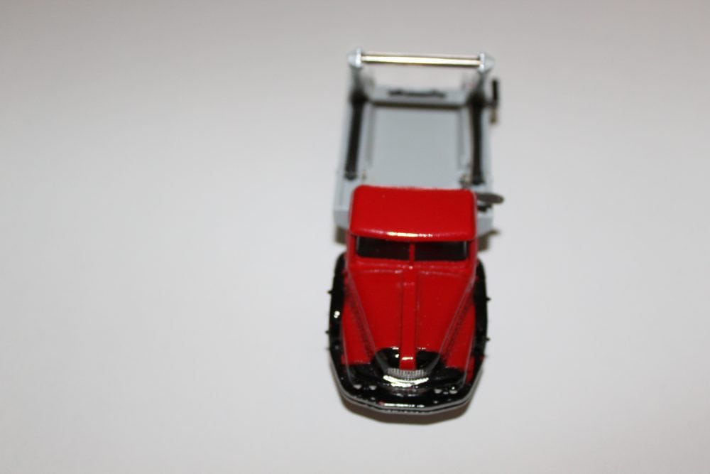 Vintage Dinky Toys 029e red half cab bus model for collectors.