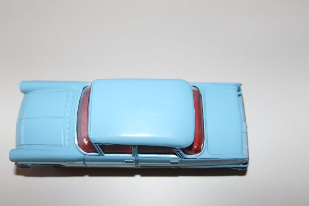 Vintage Dinky Toys Opel Kapitan model in light blue, detailed miniature car for collectors.