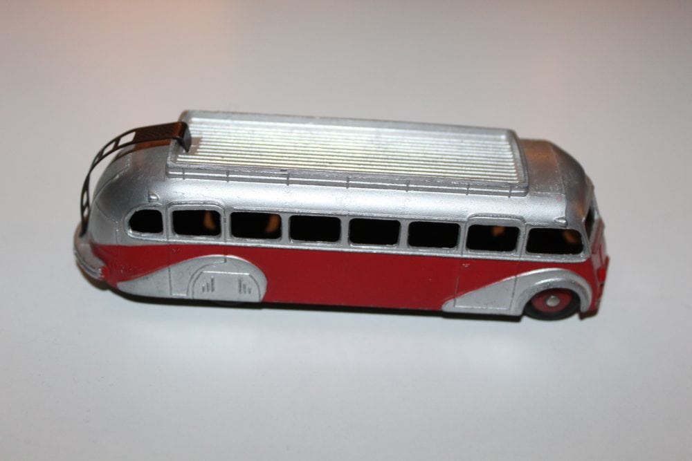 Vintage Dinky Ford covered wagon model, SNCF themed toy vehicle for collectors.