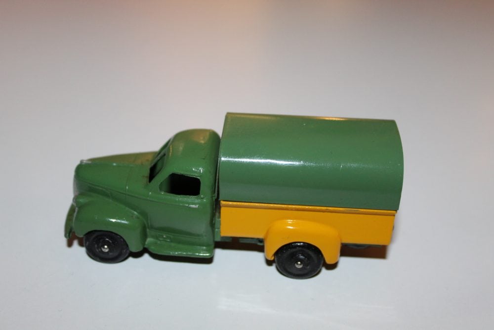 Vintage Dinky Ford covered wagon model, SNCF themed toy vehicle for collectors.