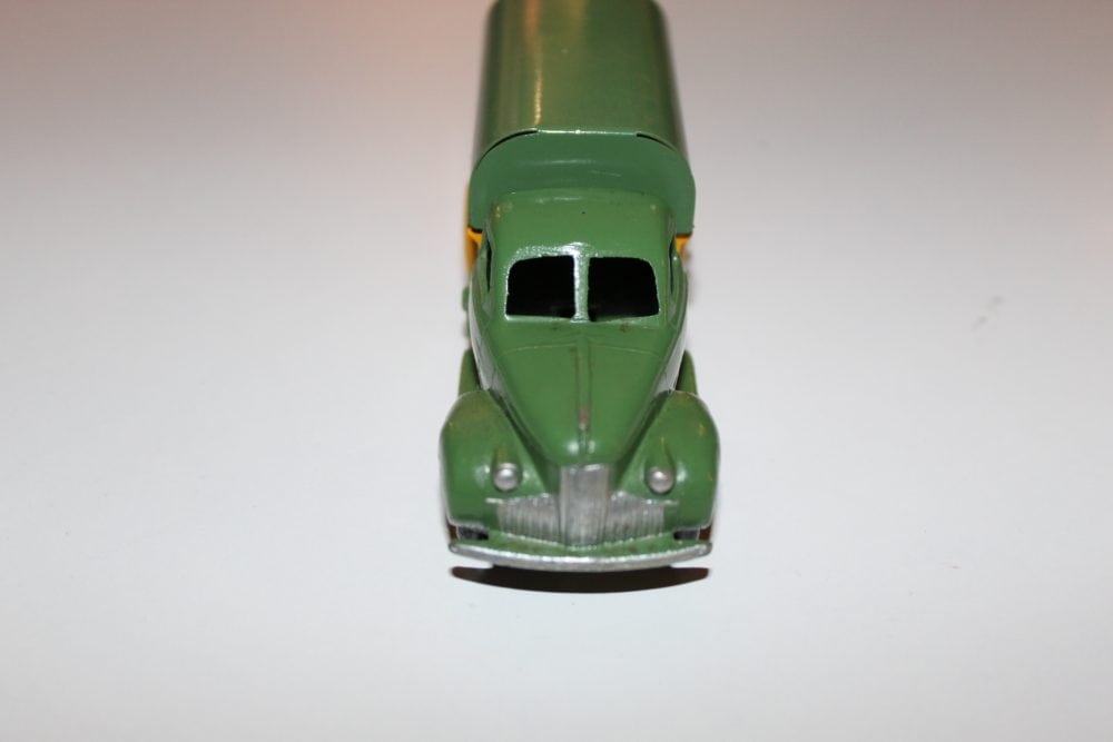 Vintage Dinky Ford Covered Wagon SNCF model in green, detailed diecast toy vehicle.