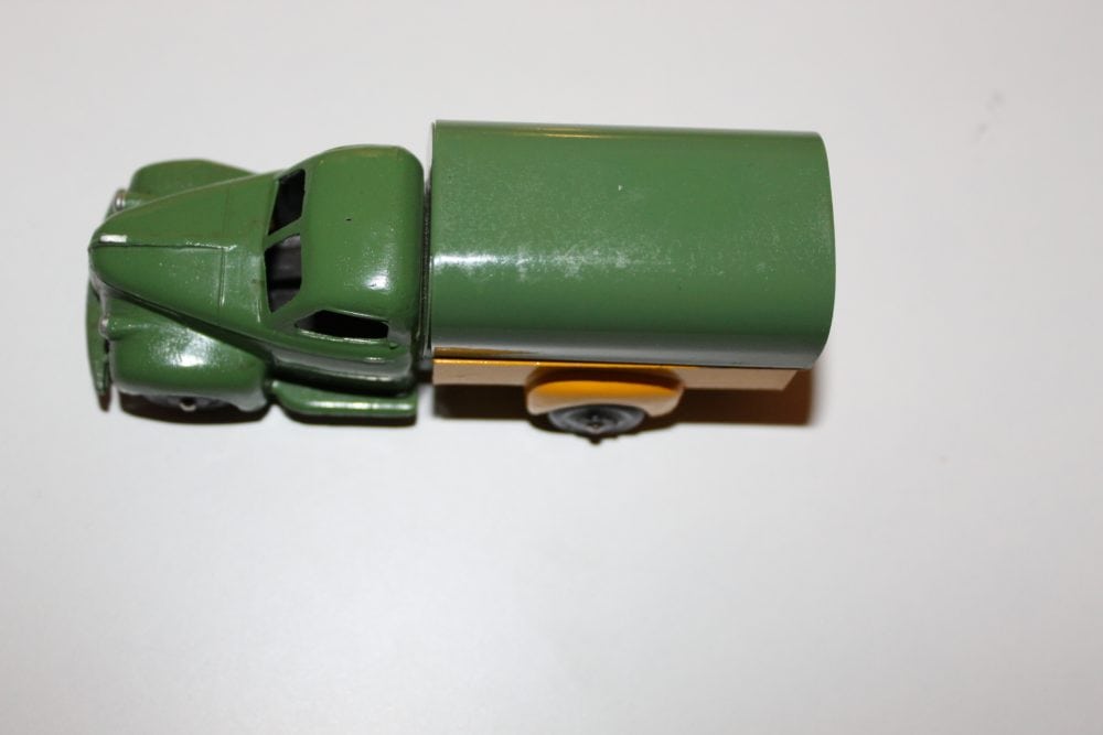 Vintage Dinky Ford truck model with green cargo trailer for collectors.