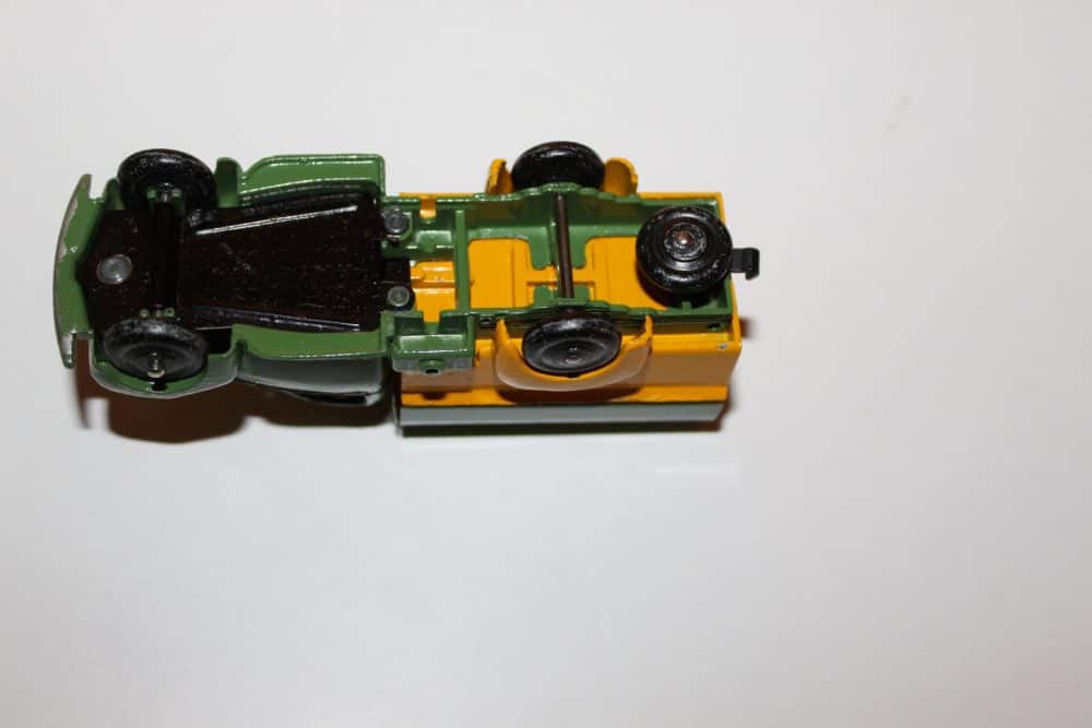 Vintage Dinky Toys Ford covered wagon model for collectors.