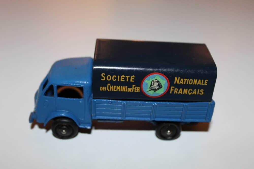 Vintage Dinky Toys Ford covered wagon model with SNCF branding.