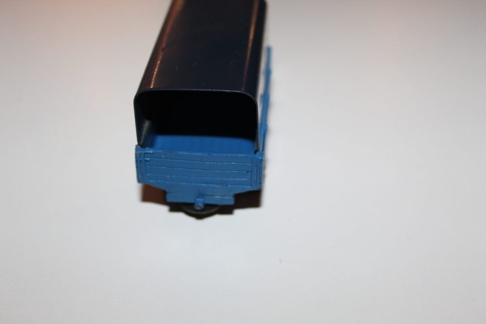 Vintage Dinky Ford Covered Wagon SNCF model in blue and black.