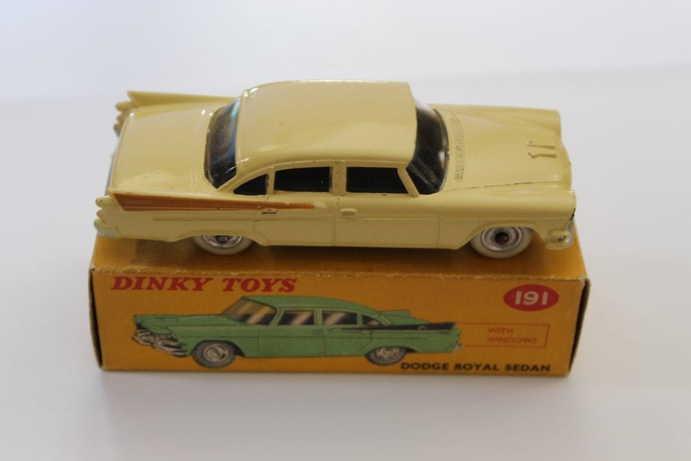 Vintage Dinky Toys 191 Dodge Royal Sedan diecast model on original box.