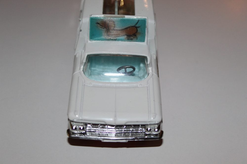 Vintage diecast Corgi Toys 486 Chevrolet Kennel Service Wagon with dog figure.