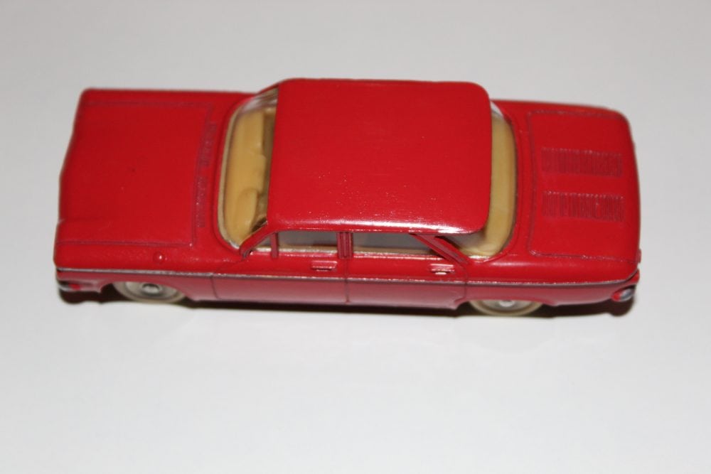 Vintage Dinky Toys 552 Chevrolet Corvair model in red.