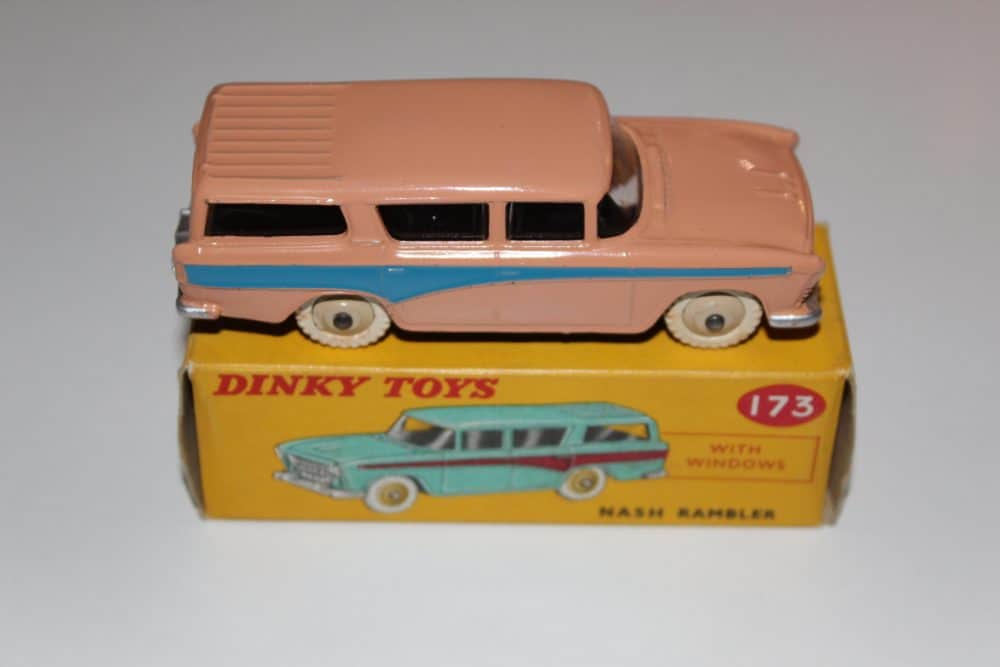 Vintage Dinky Toys Nash Rambler diecast model car, pink and blue, with original box.
