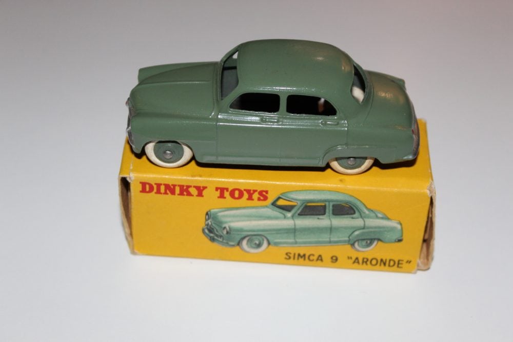 Vintage Dinky Toys Simca 9 'Aronde' miniature car on original box.