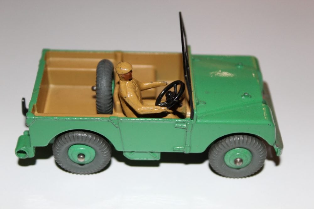 Vintage Dinky Toy Land Rover 027d/340 with driver figure.