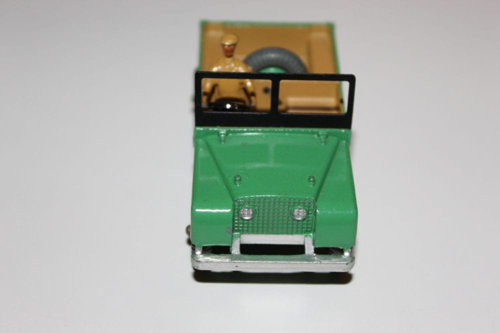 Dinky Toy Land Rover 027d/340 vintage diecast model with green body and beige interior.
