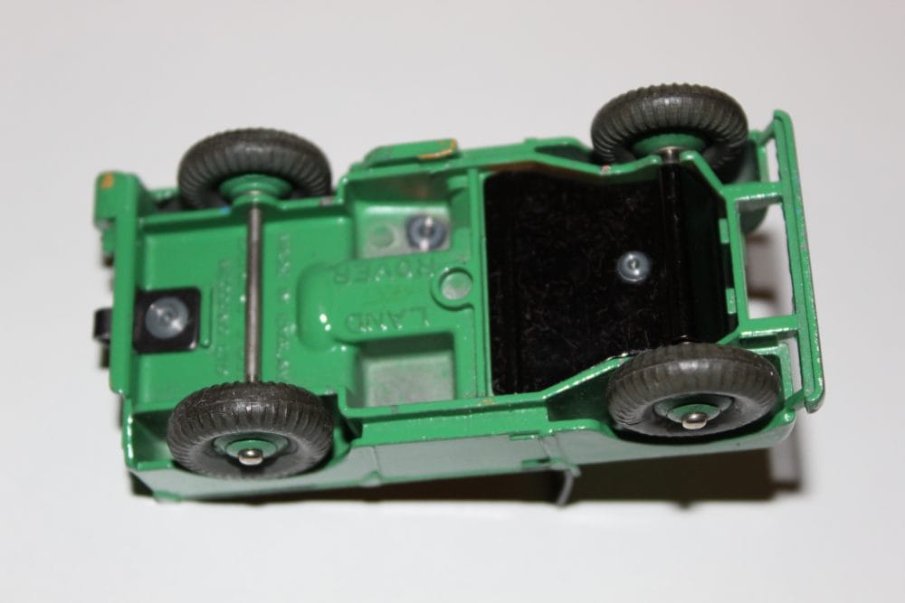 Dinky Toy Land Rover 027d/340 diecast model in green, underside view.