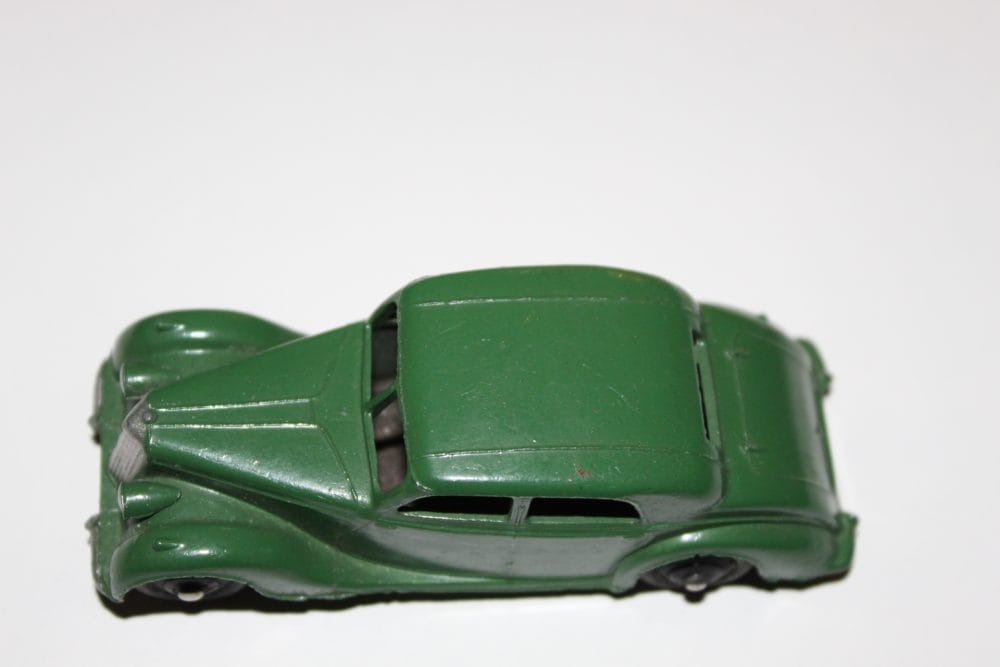 Dinky Toys 040a Riley Saloon diecast model car in green, vintage toy collectible.