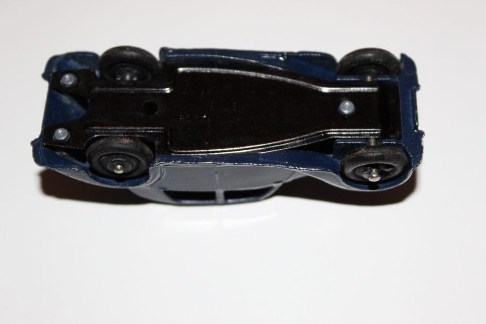 Vintage Dinky Toys 040a Riley Saloon diecast model car, underside view.