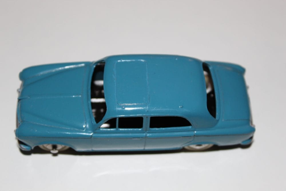 Vintage Dinky Toys 24B Peugeot 403 Berline model in blue, collectible diecast car from French Dinky.