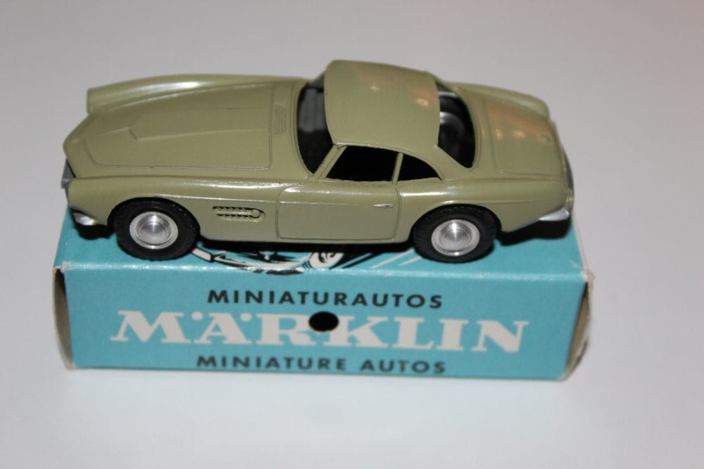 Miniature Marklin Sage Green BMW-507 toy car for collectors.