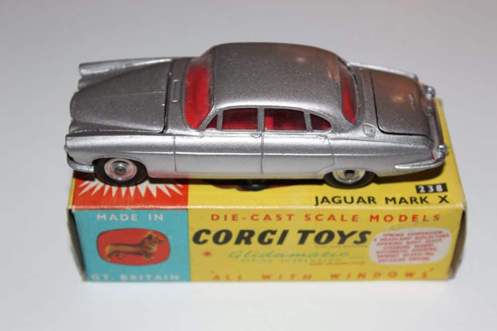 Detailed Corgi Toys 238 Jaguar Mark X diecast model on box, vintage collectible car.