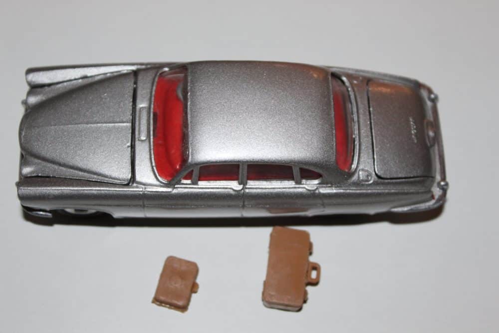 Detailed diecast model of a silver Jaguar Mark X with removable parts.