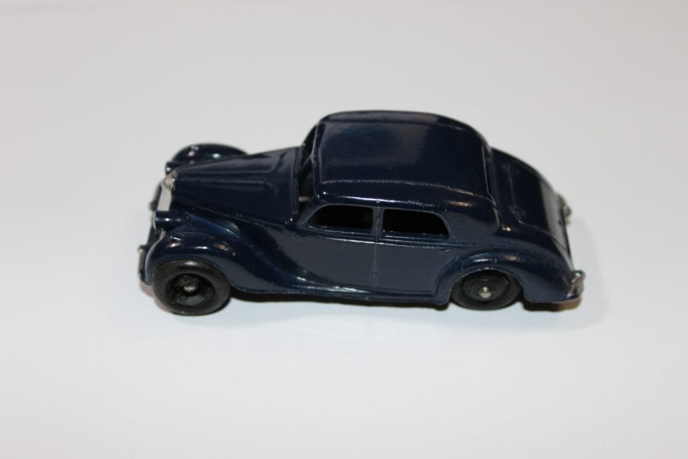 Vintage Dinky Toys 040a Riley Saloon diecast model car for collectors.