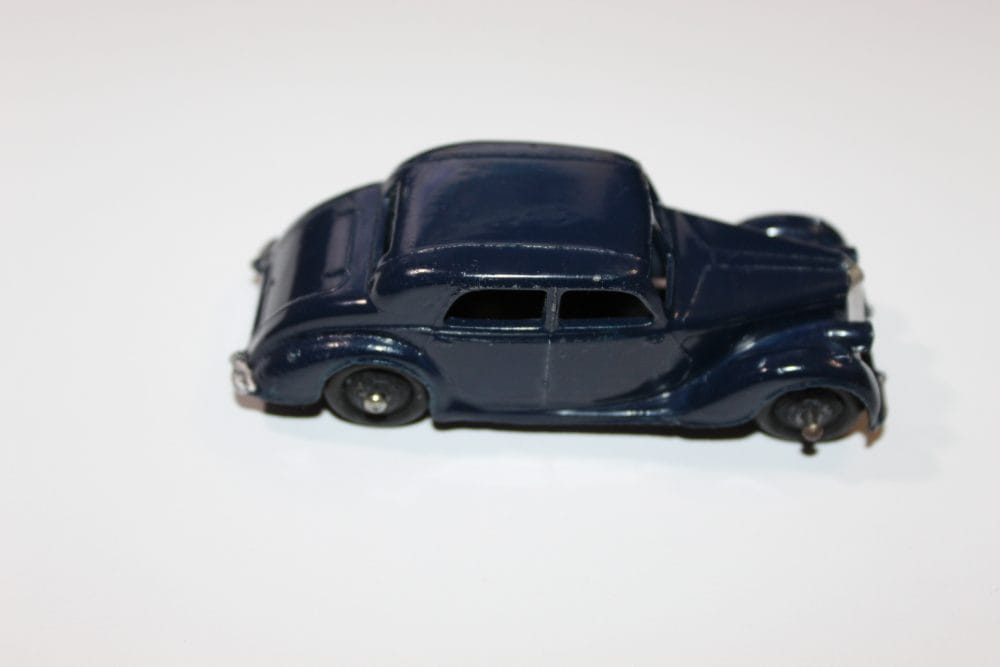 Vintage Dinky Toys 040a Riley Saloon diecast model car for collectors.