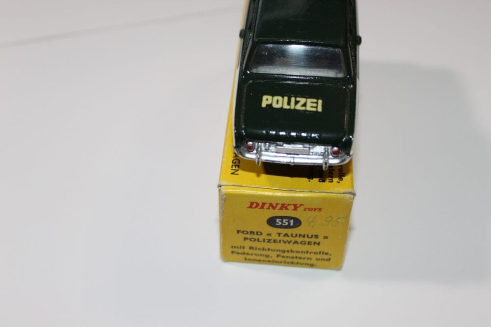 Vintage Dinky Toys 551 Police Ford Taunus model, German export, detailed diecast car.