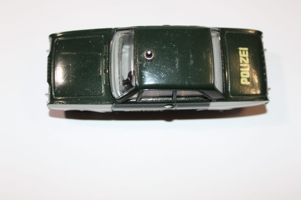 Detailed model of vintage German police car, Dinky Toys 551, Ford Taunus export.