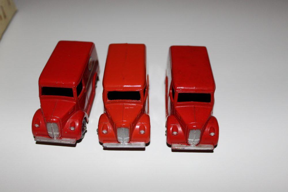 Dinky Toys 031A Trojan Vans in trade box, red diecast model vehicles.
