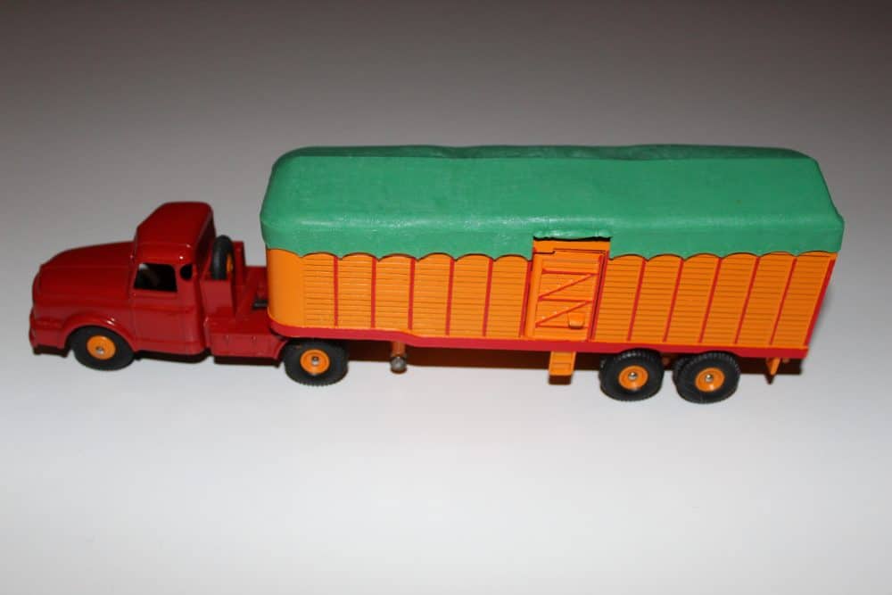 Vintage Dinky Willeme tractor with orange covered trailer, model 036B, collectible diecast toy.