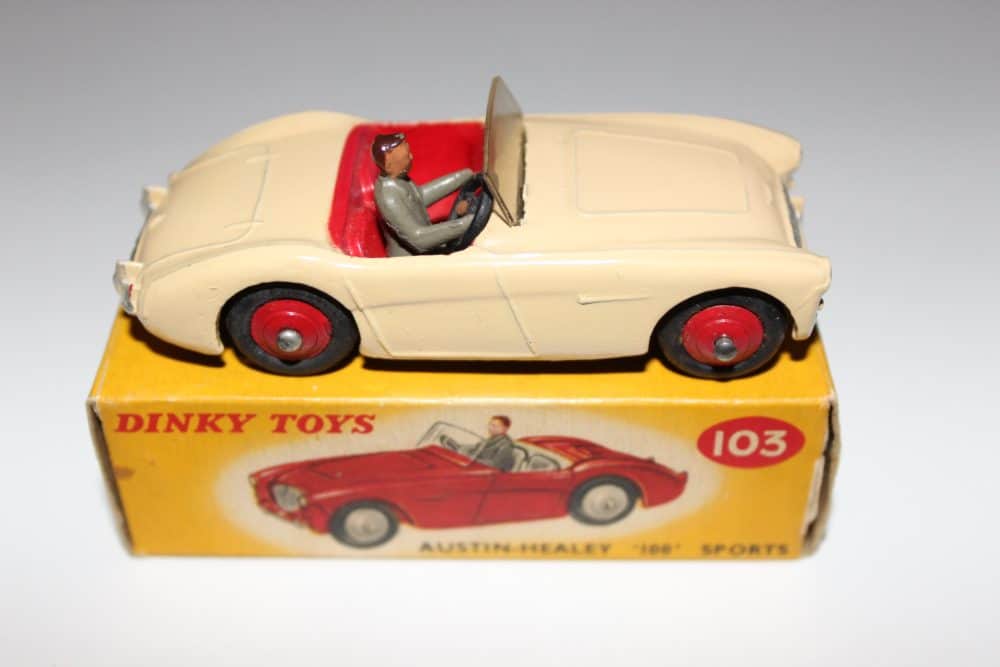 Vintage Dinky Toys 103 Austin Healey 100 Tourer model car with driver, collectible toy.