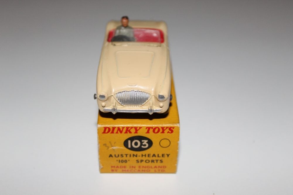 Dinky Toys 103 Austin Healey 100 Tourer diecast model on original box, vintage collectible.