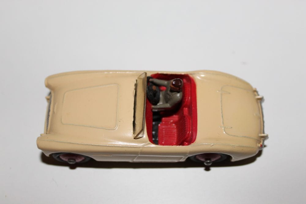 Dinky Toys 103 Austin Healey 100 Tourer model car with red interior, vintage diecast collectible.