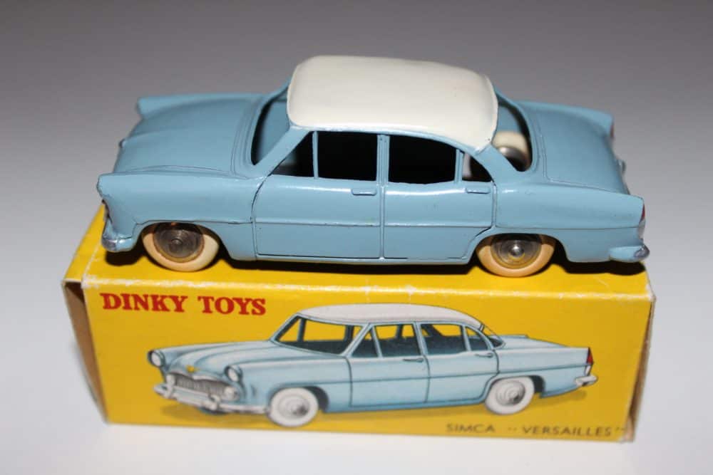 Vintage Dinky Toys Austin Healey 100 model car on box display.
