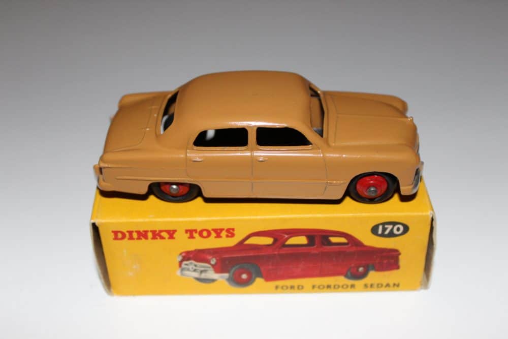 Vintage Dinky Toys Austin Healey 100 Tourer diecast model car for collectors.