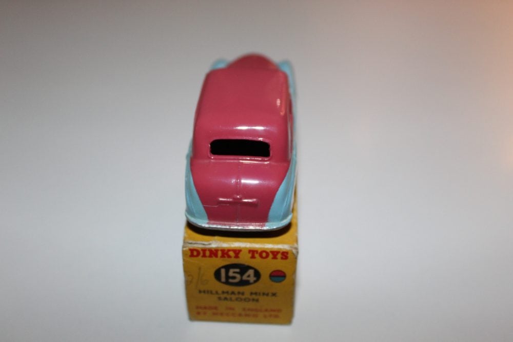 Vintage Dinky Toys 154 Hillman Minx model car on its original box.