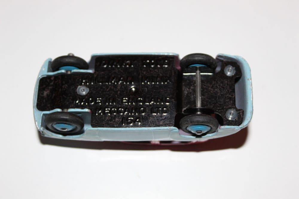 Dinky Toys 154 Hillman Minx diecast model car, underside view, vintage toy, England, 1964.
