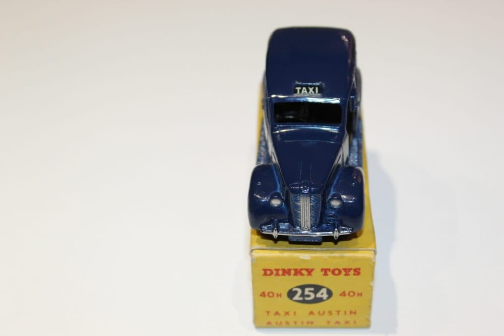 Vintage Dinky Toys Austin Taxi 40H/254, detailed diecast model for collectors.