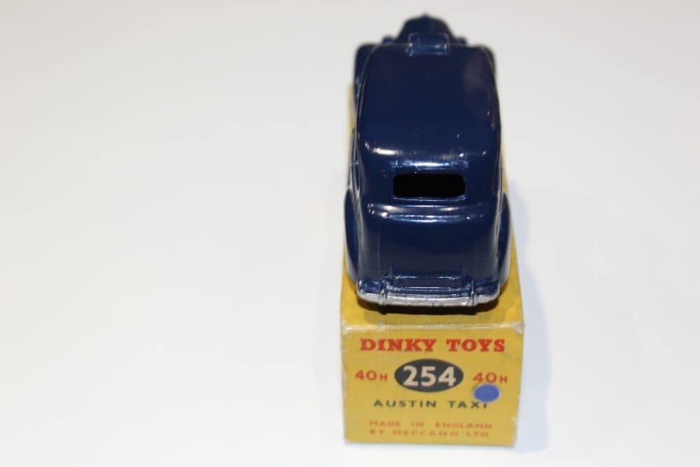 Vintage Dinky Toys Austin Taxi model in blue, detailed miniature collectible for diecast car enthusi.