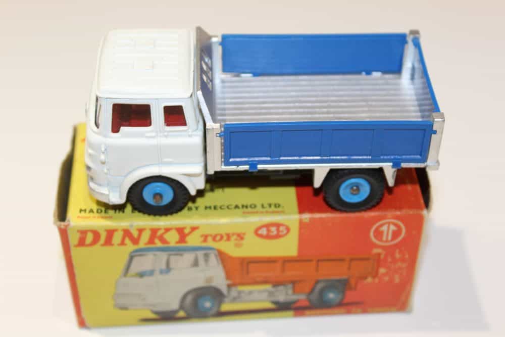 Dinky Toys Bedford TK Tipper diecast model on original box, vintage toy vehicle.