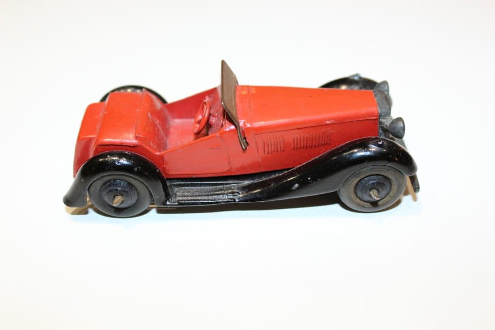 Vintage Dinky Toys Salmson 2 Seater sports car model, red and black, collectible diecast vehicle.