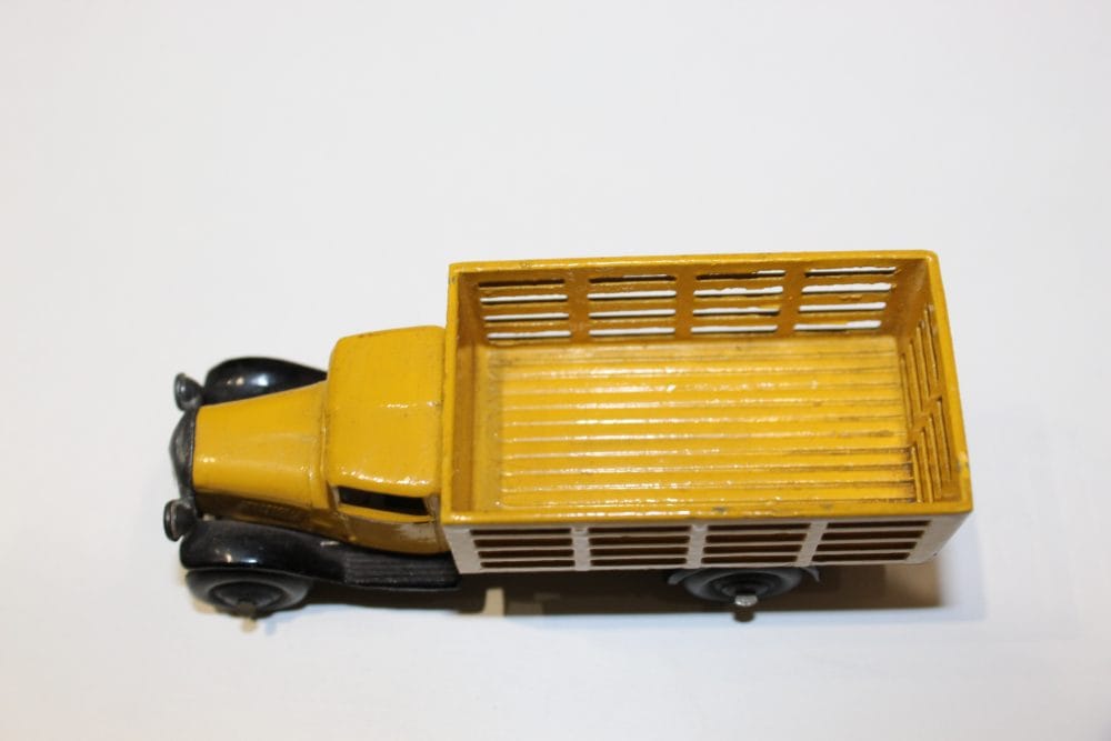 Vintage Dinky Toys 025F Market Gardeners Lorry, pre-war model, yellow with open cargo bed.