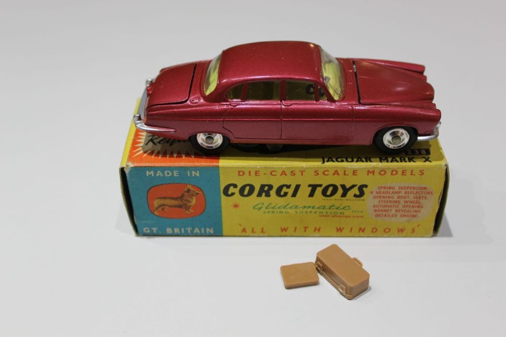 Vintage Corgi Toys 238 Jaguar Mark 10 die-cast model with box and accessories.